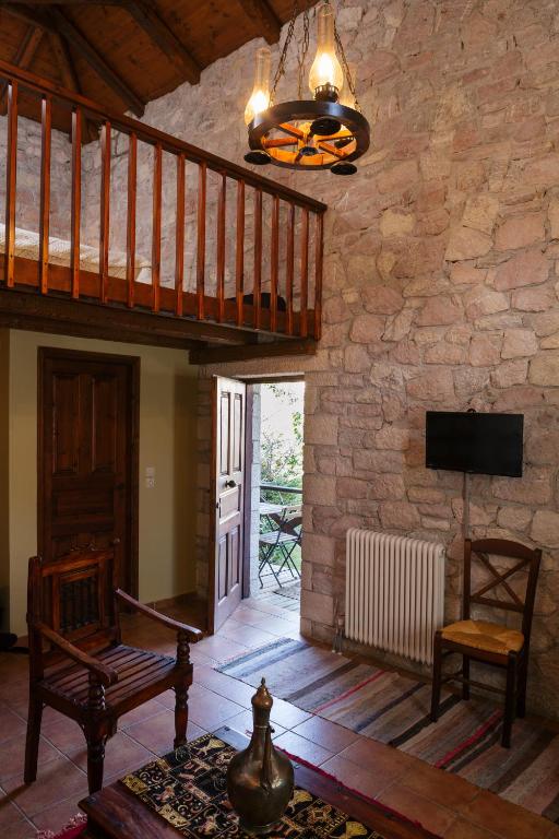 TV a/nebo společenská místnost v ubytování Guesthouse Armakas