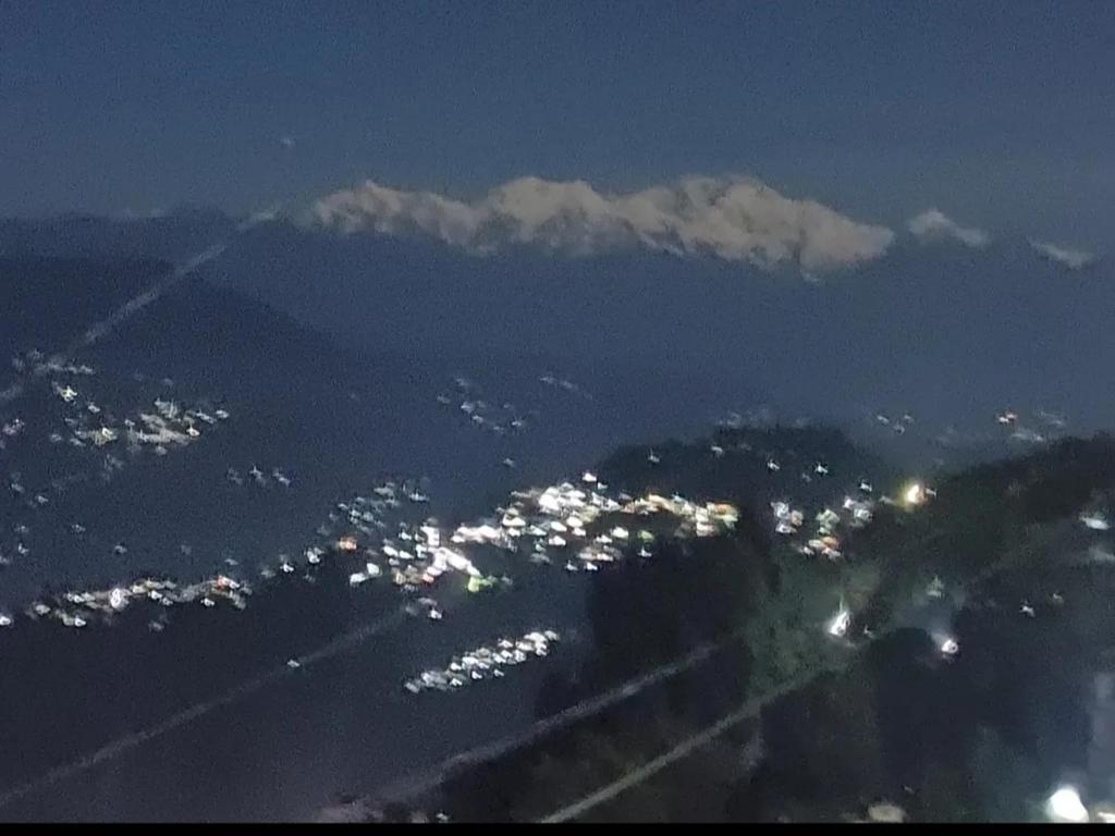 Γενική θέα στο βουνό ή θέα στο βουνό από  αυτό το δωμάτιο σε οικογενειακή κατοικία