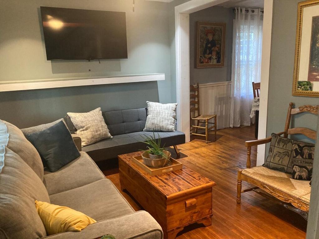 a living room with a couch and a table at New Leeds listing Near Graces diner and Hudson! in Catskill