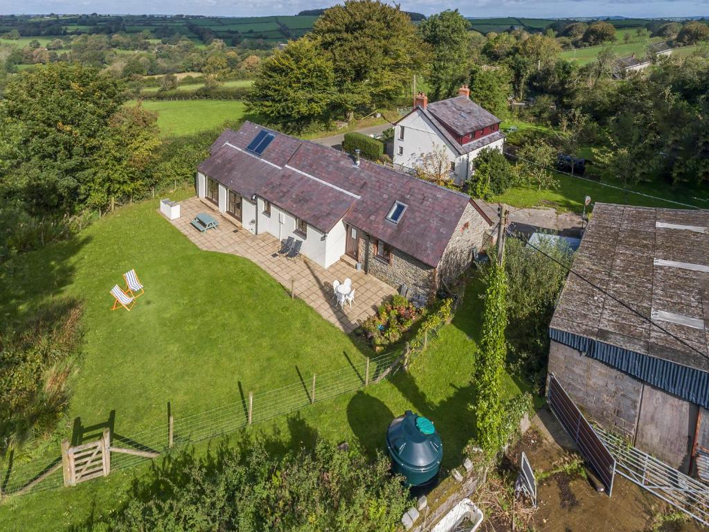 an aerial view of a house with a large yard at Kite Cottage in Capel-Ifan