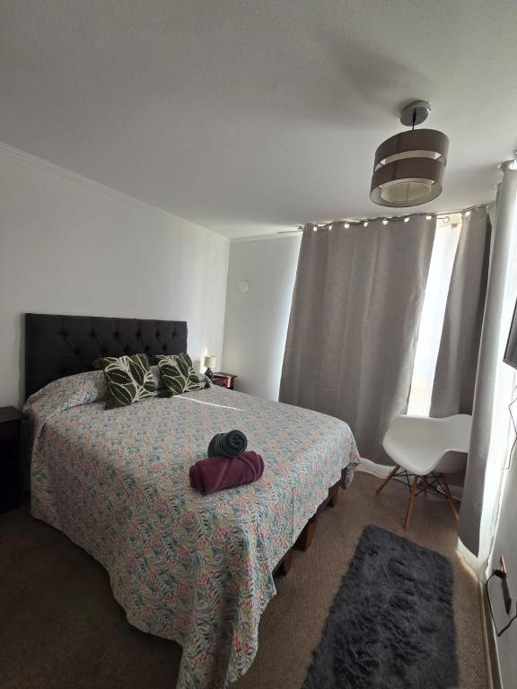 Giường trong phòng chung tại En MACHALI Tranquilidad y comodidad Parcking wifi