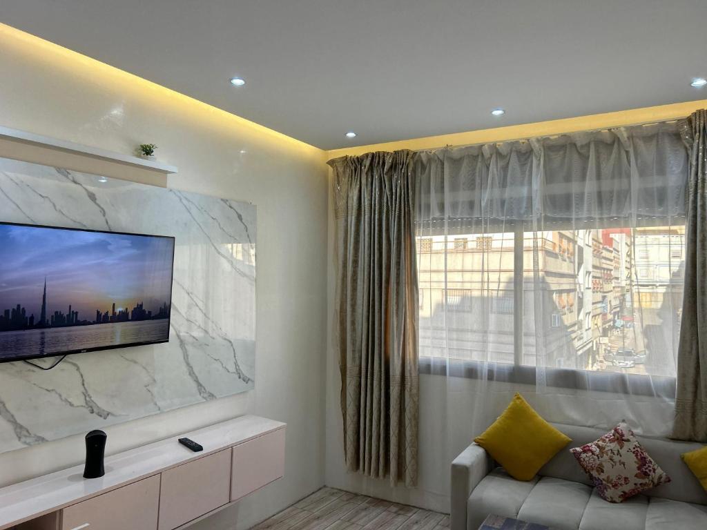 TV a/nebo společenská místnost v ubytování Studio sky lux 94