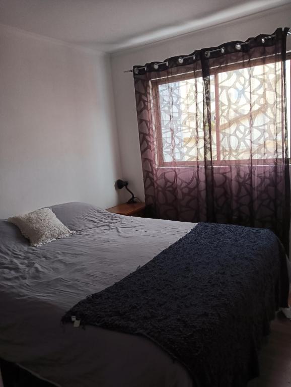 Ένα ή περισσότερα κρεβάτια σε δωμάτιο στο Casa Acquarella