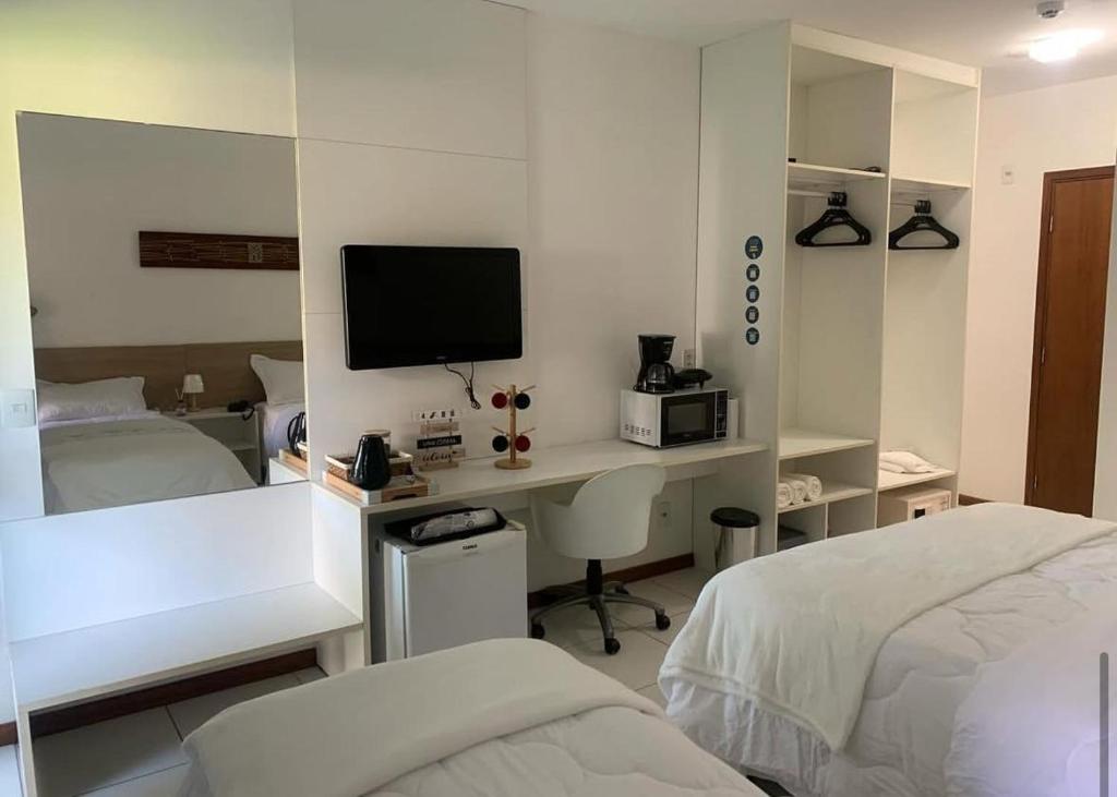 Una cama o camas en una habitación de Iloa resort