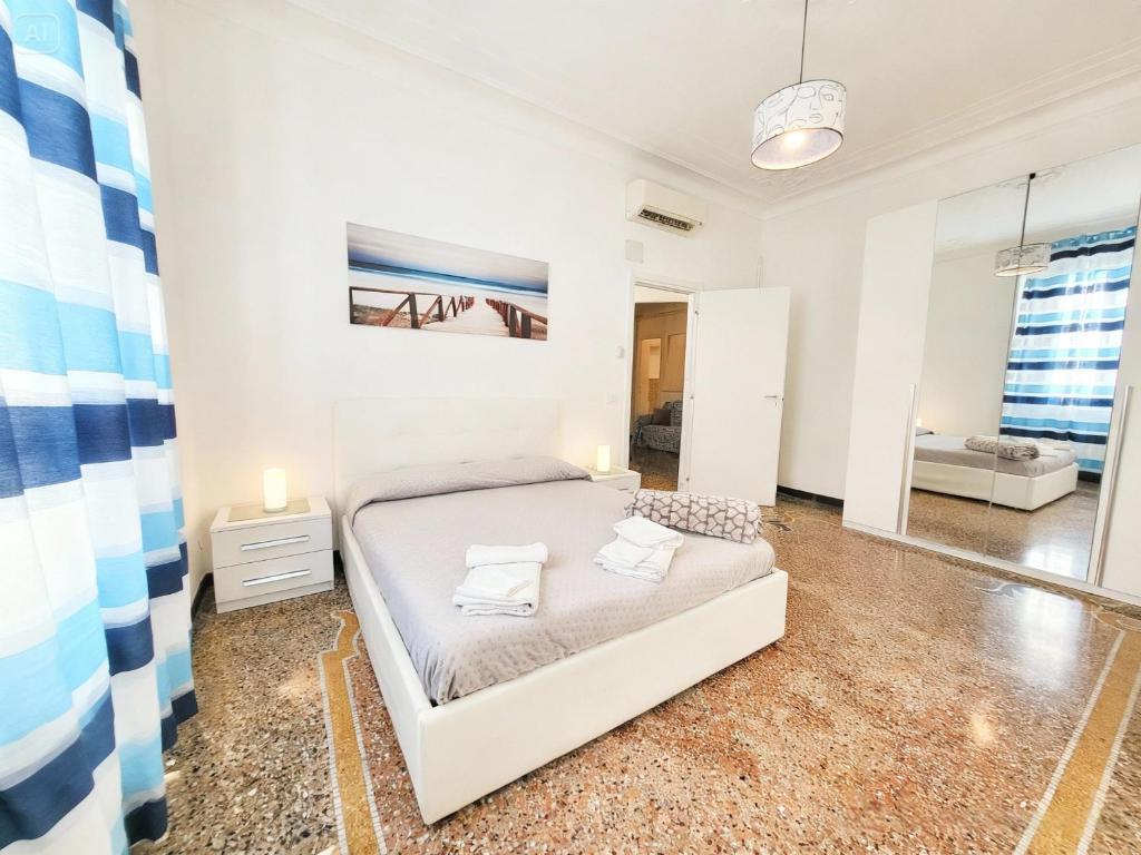 Postel nebo postele na pokoji v ubytování Brignole Home