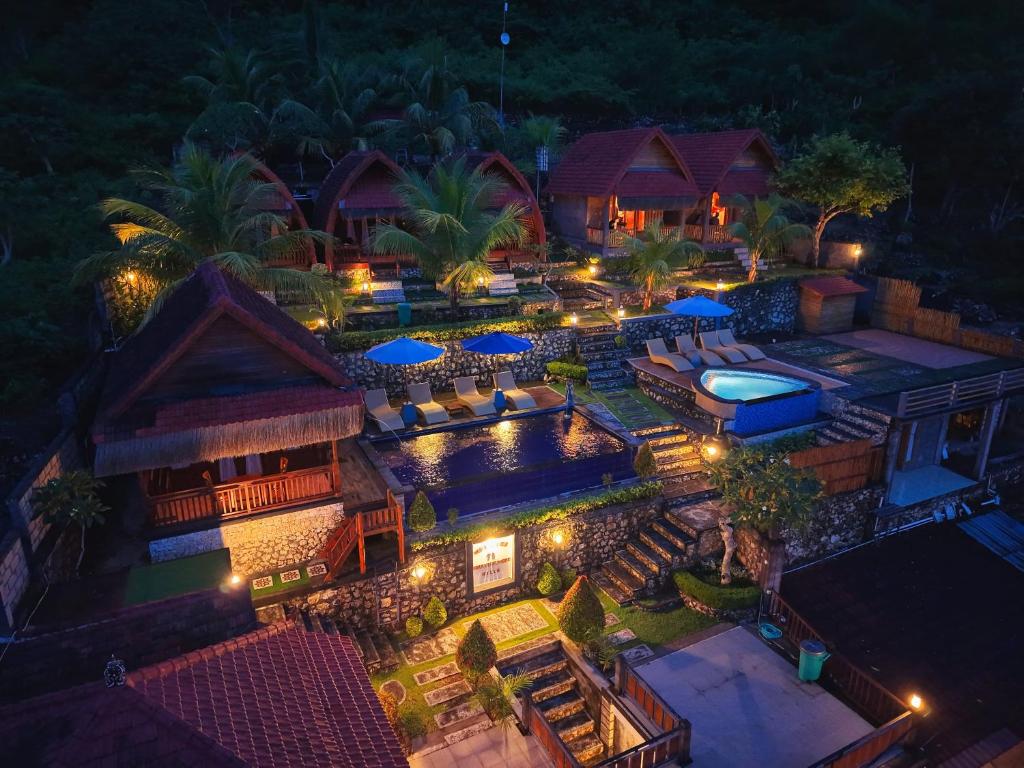 an aerial view of a resort at night at Sebuluh Sunset Hill in Nusa Penida
