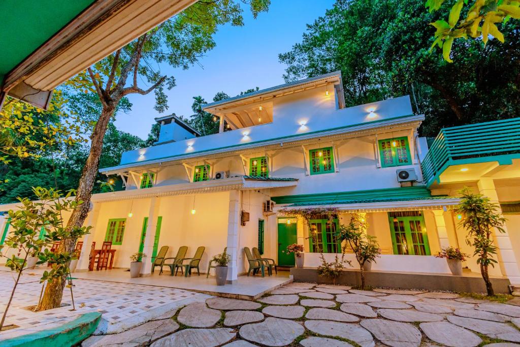 an exterior view of a white house at Istana Villa Mirissa in Mirissa