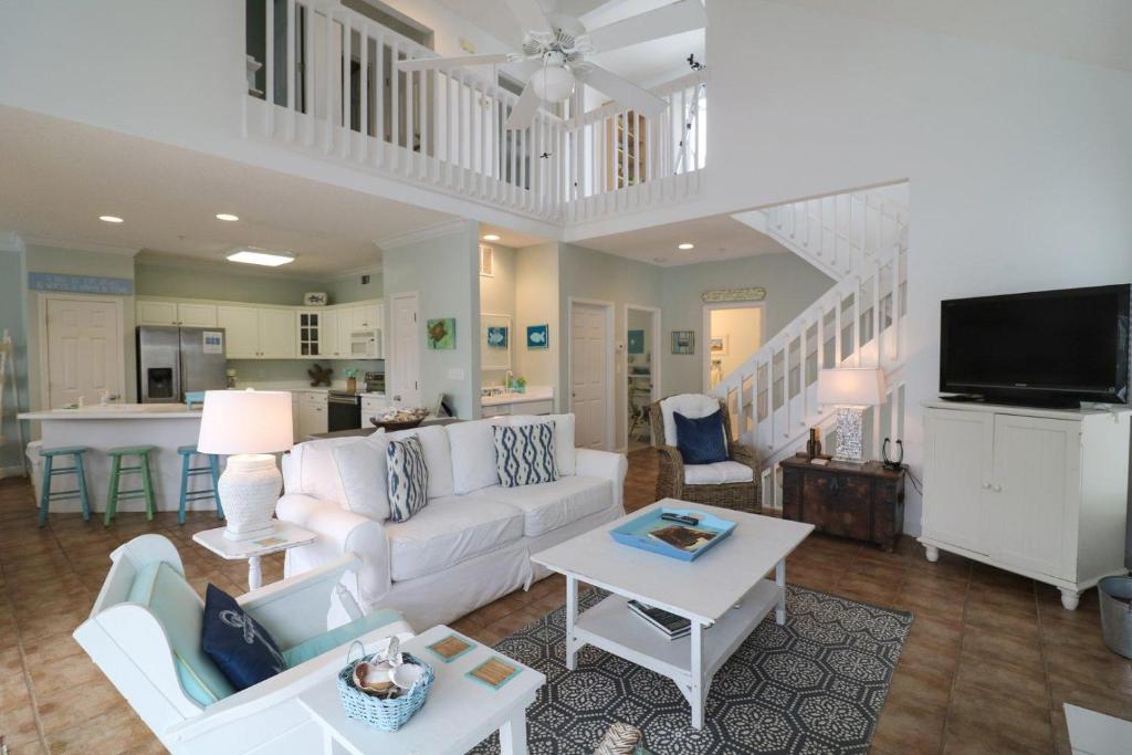 a living room with a couch and a table at #3 B 18th Place in Tybee Island