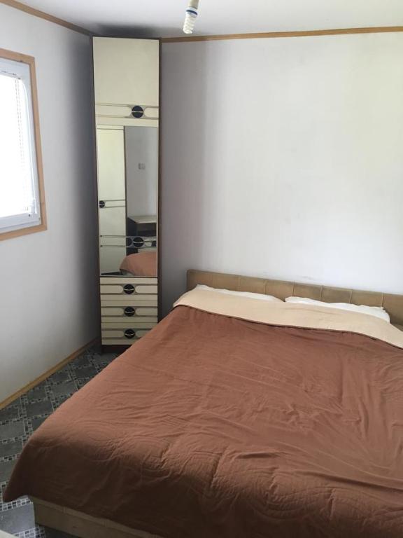 Postel nebo postele na pokoji v ubytování Ada Bojana Apartmani