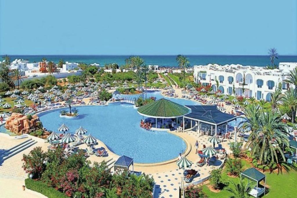 an aerial view of a resort with a swimming pool at Djerba Holiday Beach in Midoun