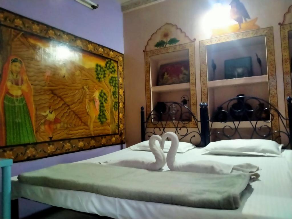 Ένα ή περισσότερα κρεβάτια σε δωμάτιο στο Golden dream guest house