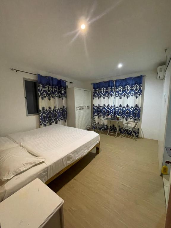 Ένα ή περισσότερα κρεβάτια σε δωμάτιο στο Hao stay