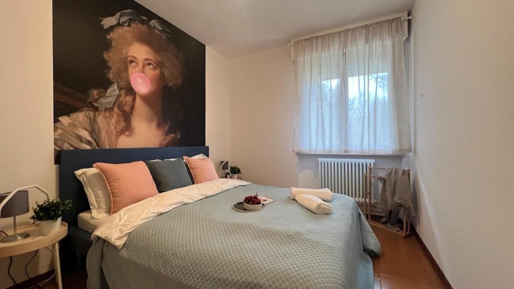 Ένα ή περισσότερα κρεβάτια σε δωμάτιο στο Appartamento Caterina