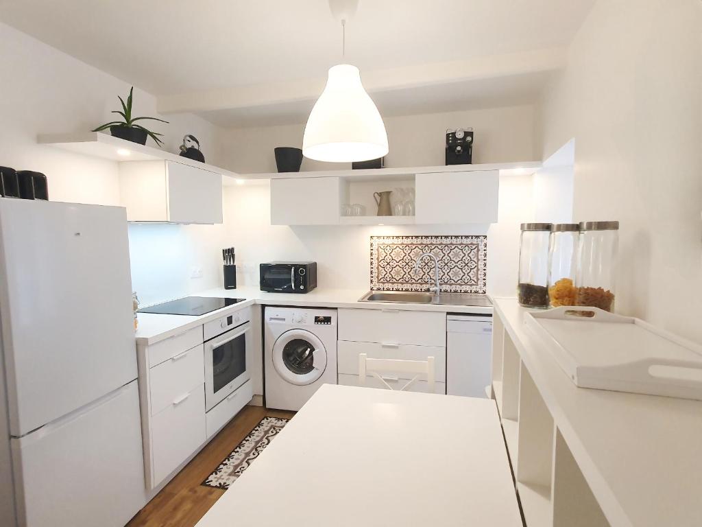 Kuchyň nebo kuchyňský kout v ubytování Hyper centre, quartier du port