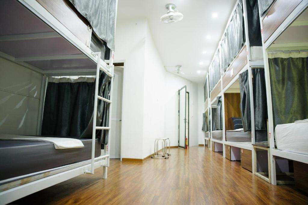 Postel nebo postele na pokoji v ubytování Hanoi Train Street Hostel