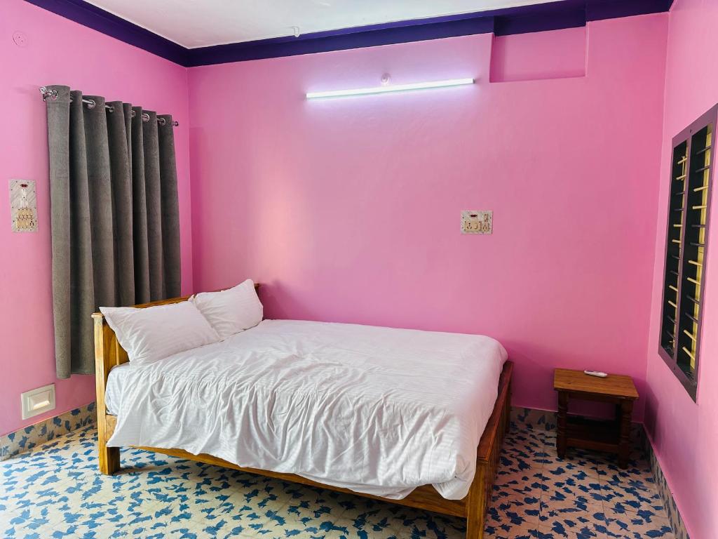 Ένα ή περισσότερα κρεβάτια σε δωμάτιο στο Welcomehomestay