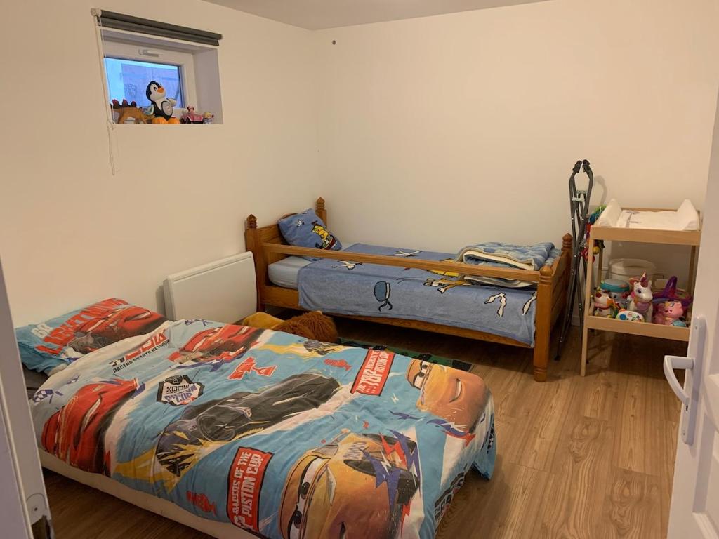 Postel nebo postele na pokoji v ubytování Maison à la campagne