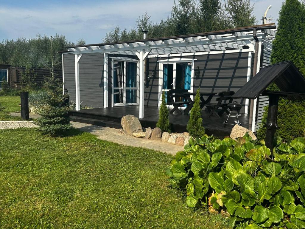 Zahrada ubytování Wellness chill domek na Kaszubach,Gołubie ,saunowy zakątek z balia pod gwiazdami