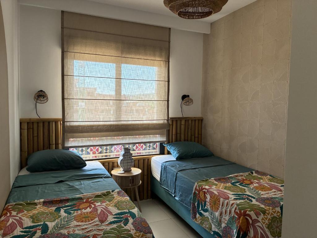 Postel nebo postele na pokoji v ubytování Casa Tranquila - Paradise Resort