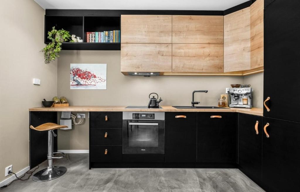 Kuchyň nebo kuchyňský kout v ubytování Trondheim's smallest detached house in the middle of the city centre!