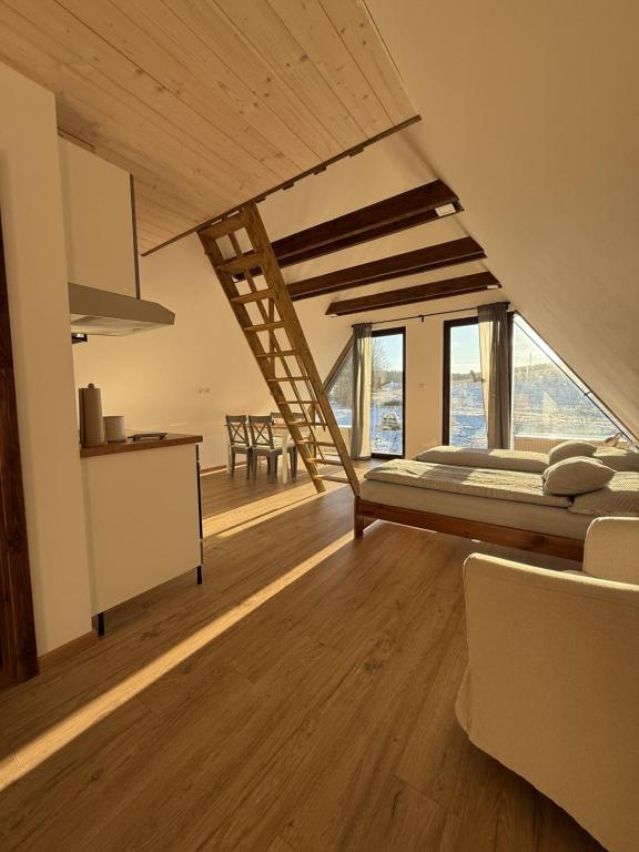 Postel nebo postele na pokoji v ubytování Chalupa Bartlův Dvůr