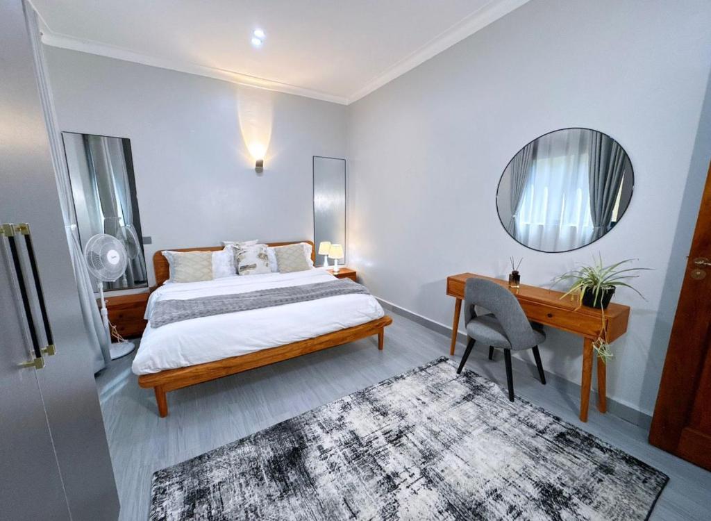 Ένα ή περισσότερα κρεβάτια σε δωμάτιο στο Qstay Luna