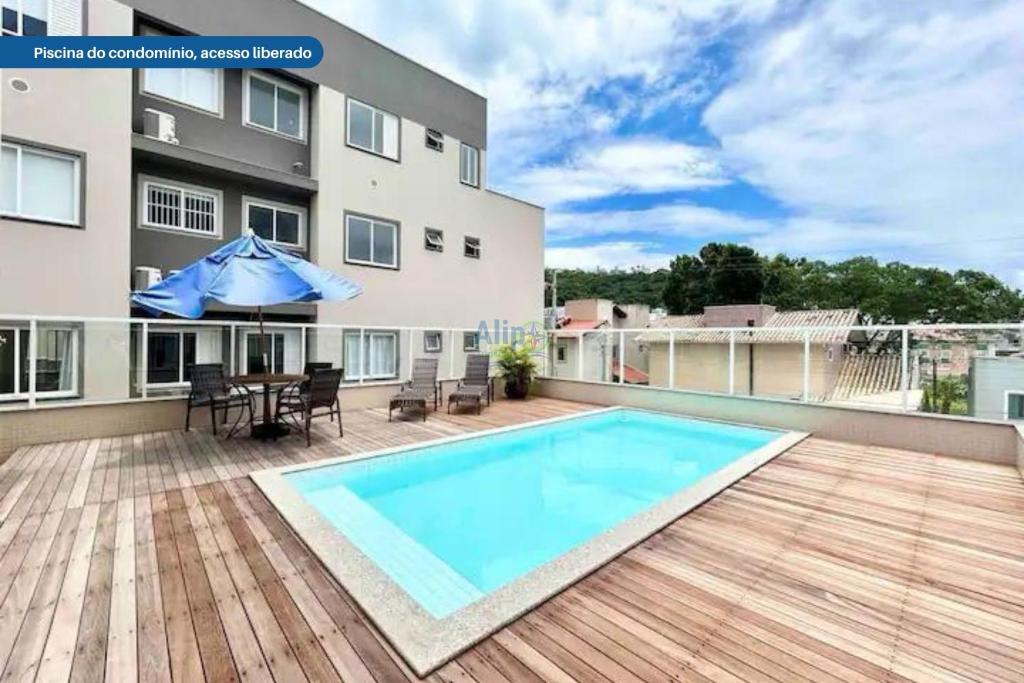 La alberca dentro o cerca de Apartamento 104 B com Piscina em Bombinhas