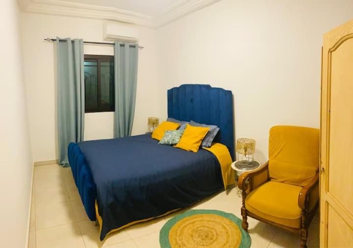 Ένα ή περισσότερα κρεβάτια σε δωμάτιο στο Appart cosy N'Gor Dakar F3 2ch