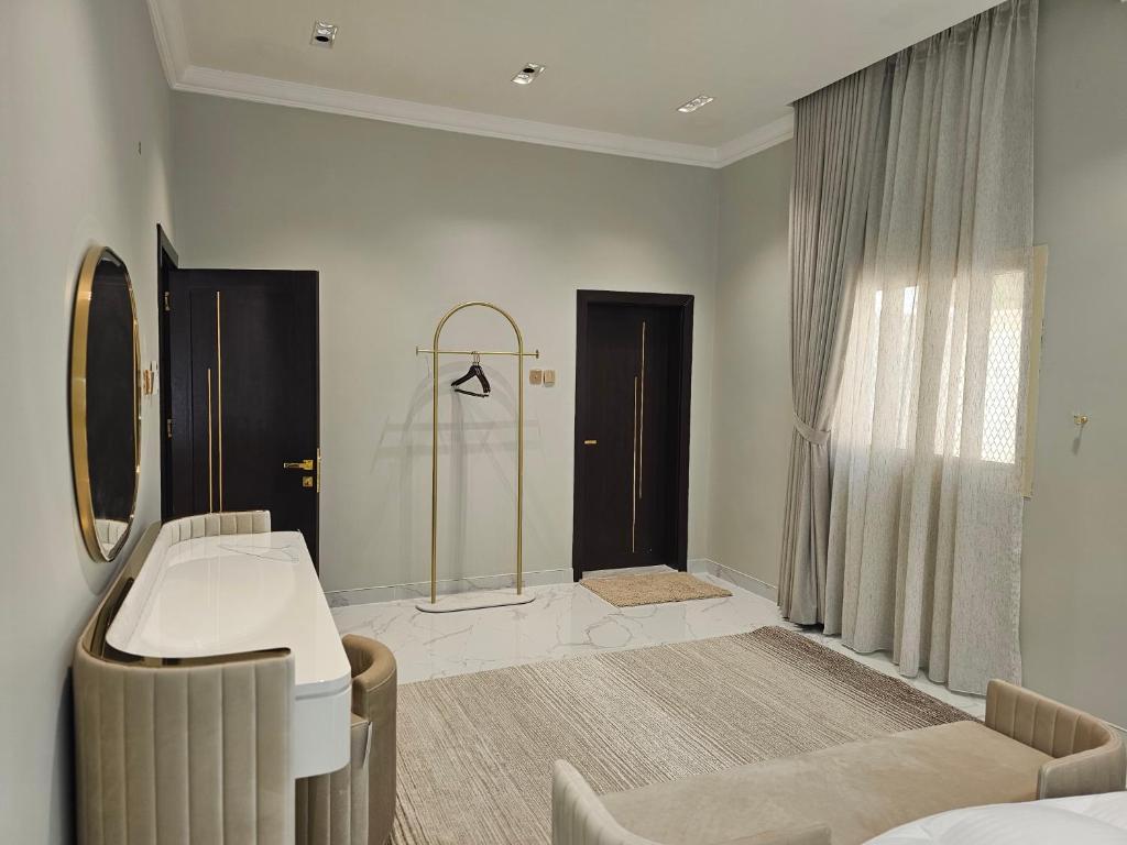 Ένα ή περισσότερα κρεβάτια σε δωμάτιο στο hatta sky