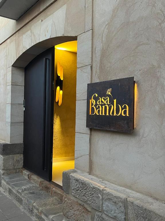 a sign on the side of a building at Casa Rural en Zamora Casa Bamba in Villalobos