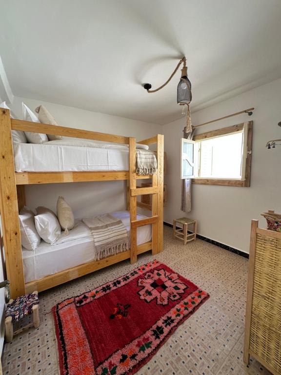 Postel nebo postele na pokoji v ubytování Grip Sea Morocco