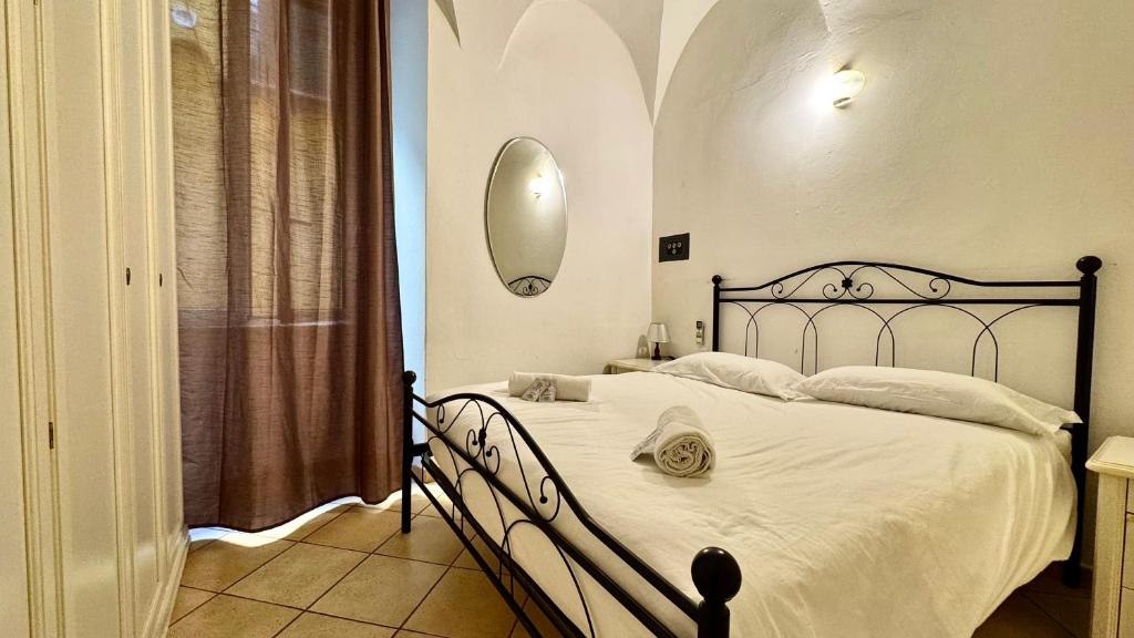 Postel nebo postele na pokoji v ubytování [2 passi dal mare di Alassio] Ampio trilocale