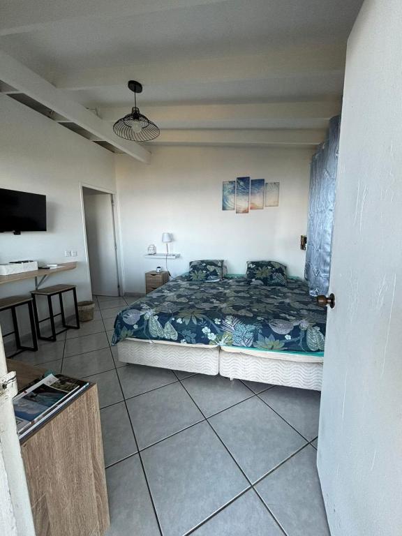 Manohei Lodge- Chambre indépendante Pamatai - photo 6 - Tahiti, Polynésie