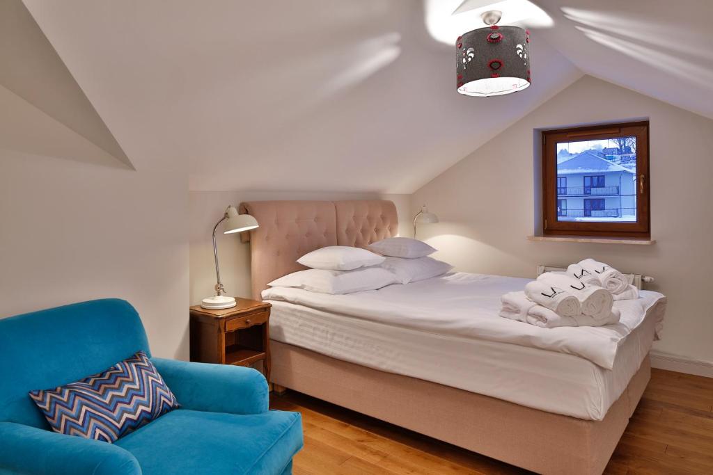 Posteľ alebo postele v izbe v ubytovaní Lemon Apartments