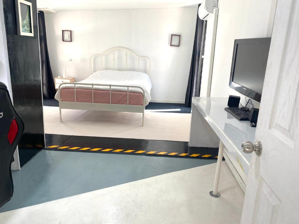 Postel nebo postele na pokoji v ubytování AkkHouse