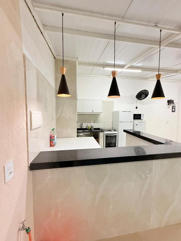 Η κουζίνα ή μικρή κουζίνα στο Casa com Piscina em Hortolândia