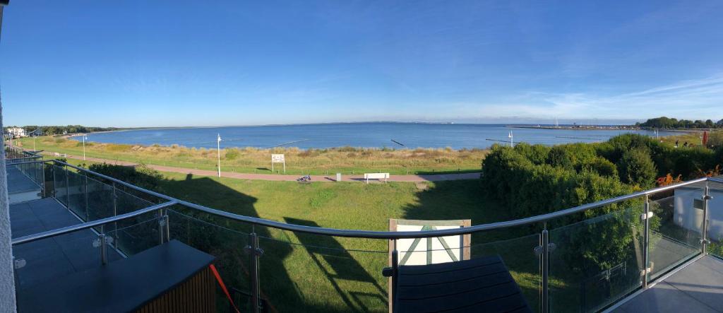 a balcony with a view of a body of water at Fewo Lia in Niederdorla