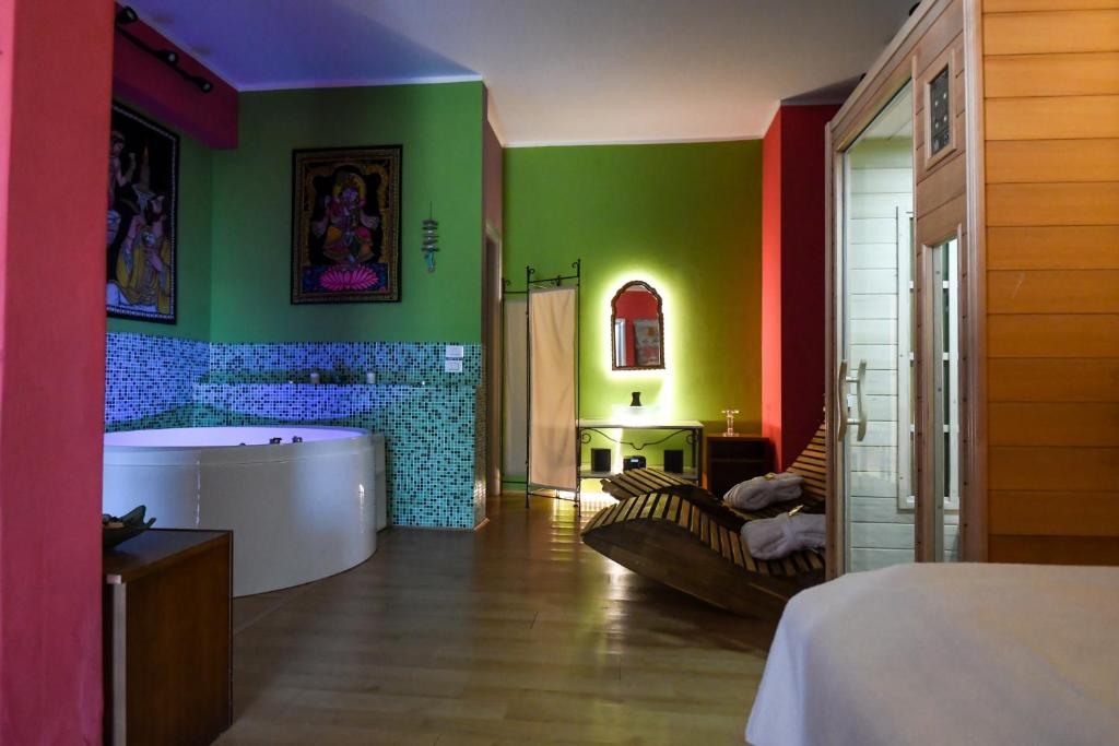 Postel nebo postele na pokoji v ubytování Suite con SPA Privata - Hotel Riva Etrusca