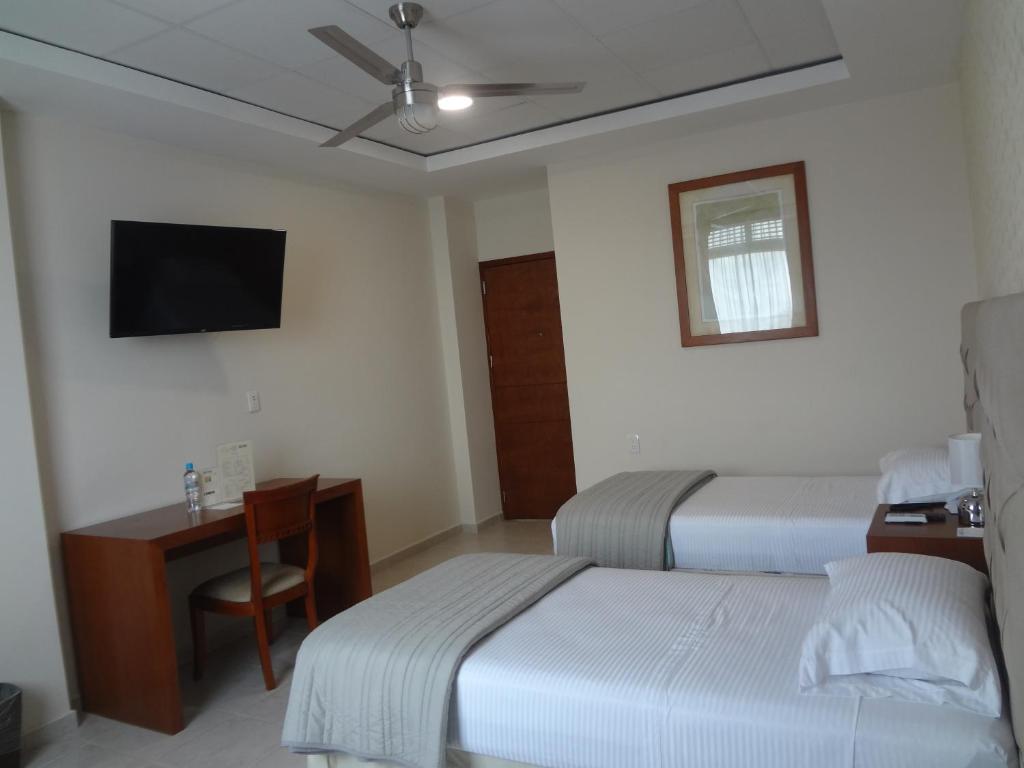 Postel nebo postele na pokoji v ubytování Hotel Civic Express
