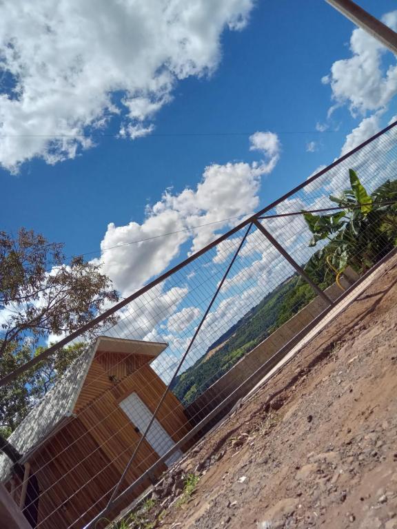 a view of a fence with the sky in the background at Mirante in Frederico Westphalen