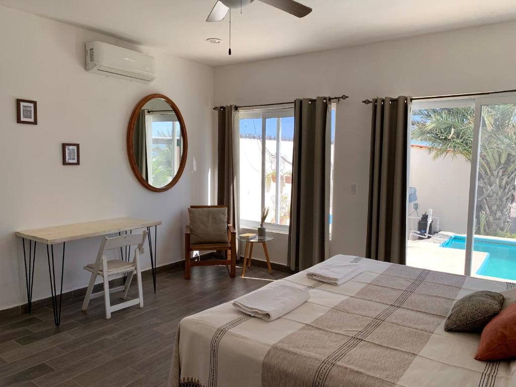 Postel nebo postele na pokoji v ubytování The Colony La Ventana