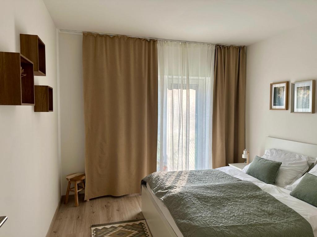 Ένα ή περισσότερα κρεβάτια σε δωμάτιο στο Prague Airport Apartment