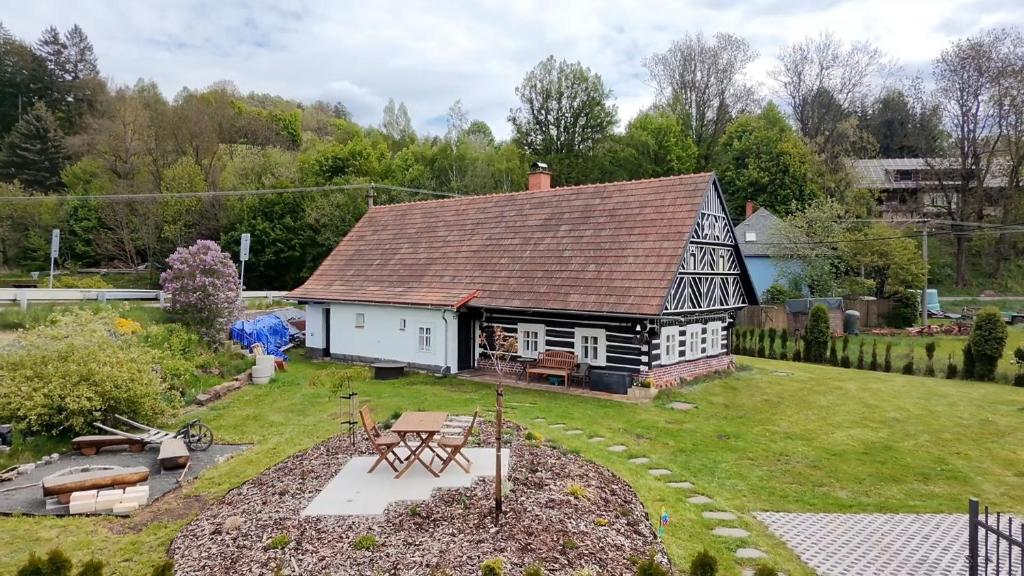 an aerial view of a house with a garden at Poloroubenka Podkrkonoší in Bělá