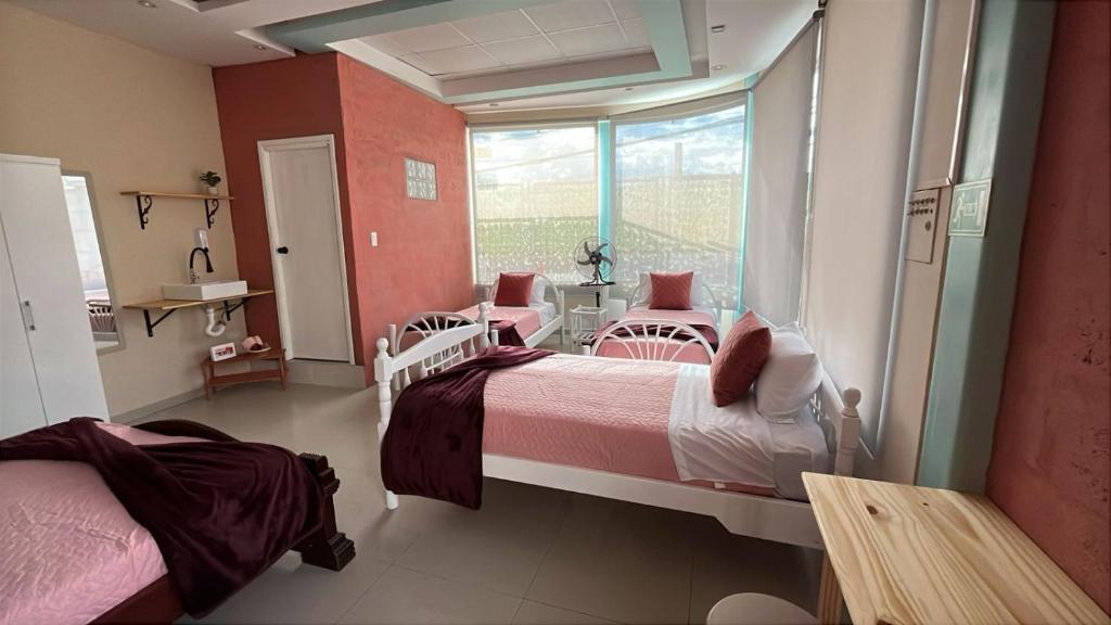 Postel nebo postele na pokoji v ubytování Chakiñan Hospedaje & Eventos