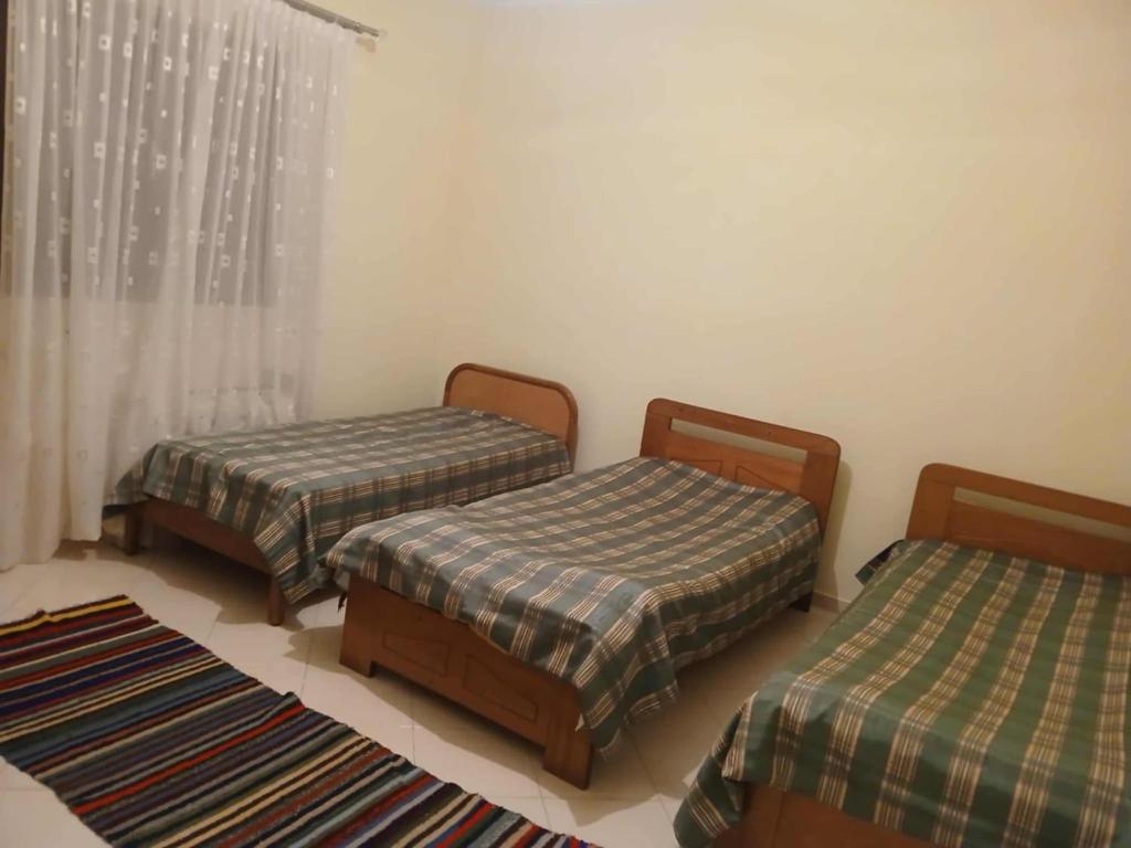 Giường trong phòng chung tại Valbona