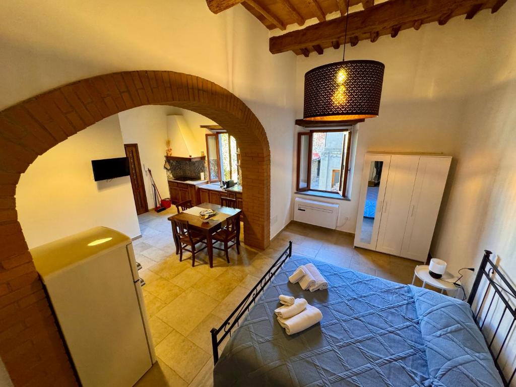 TV a/nebo společenská místnost v ubytování Case nel Borgo