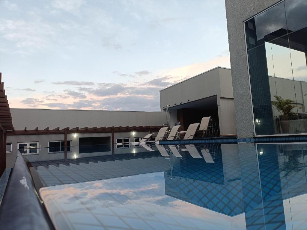 Hồ bơi trong/gần Apartamento Home Club, com dois quartos!