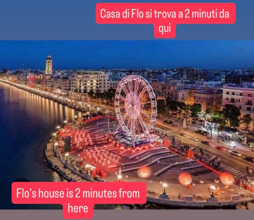 een stad met een reuzenrad en een stad bij Casa di Fló in Bari