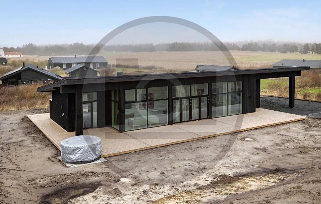 a house being built on a construction site at Stunning Home In Spøttrup With Sauna in Lem