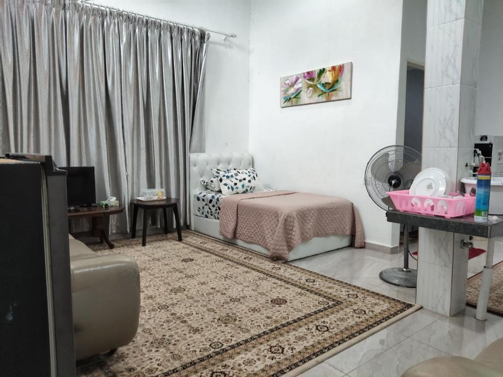 Ένα ή περισσότερα κρεβάτια σε δωμάτιο στο Makwan Homestay B